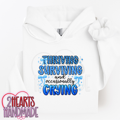 Thriving, Surviving and Occasionally Crying